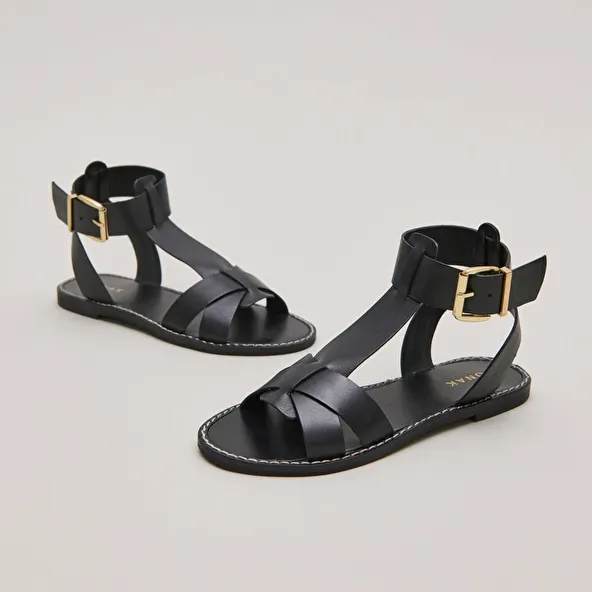 Buckle and strap sandals in black leather