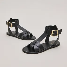 Buckle and strap sandals in black leather