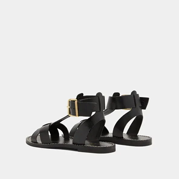 Buckle and strap sandals in black leather