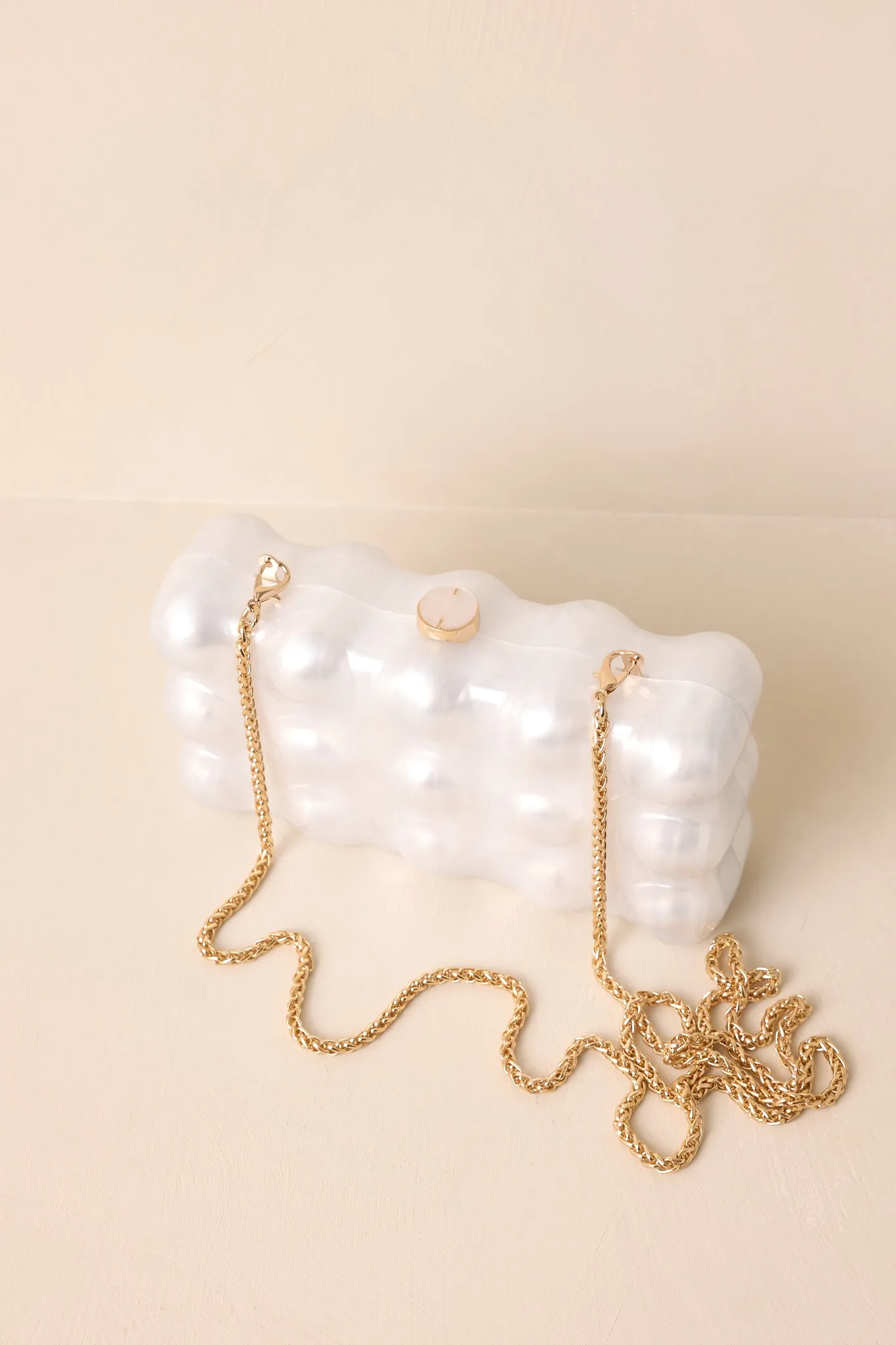 Eclipse’s Whisper Ivory Pearlescent Clutch
